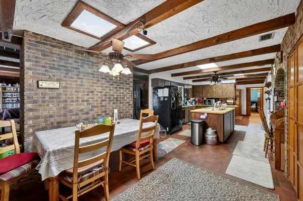 a kitchen with a stove and a refrigerator