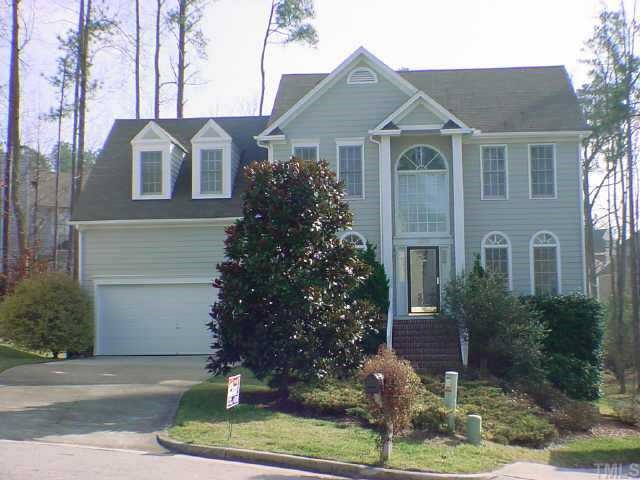 12004 Amoretto Way Raleigh, NC 27613 - Photo 1 of 1 a front view of a house with garden