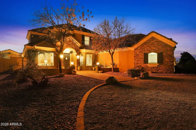 an aerial view of house with yard