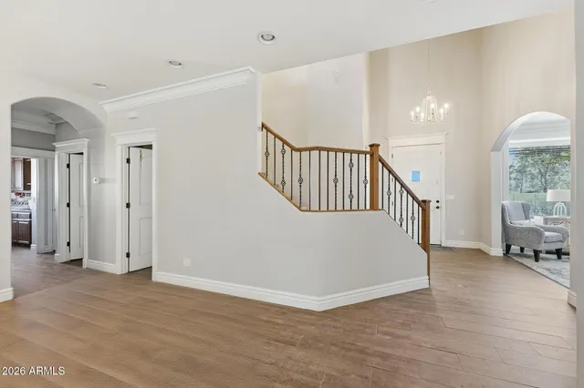 a kitchen with stainless steel appliances granite countertop a stove sink and cabinets