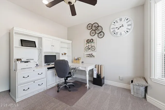 a white bath tub sitting next to a window