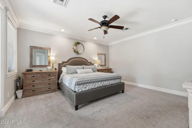 a view of a house with a backyard porch and sitting area