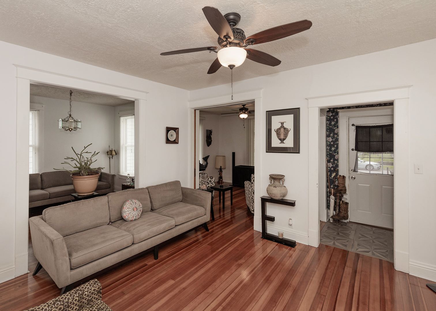 1839 15th Street Moline, IL 61265 - Photo 11 of 32 a living room with furniture and a wooden floor