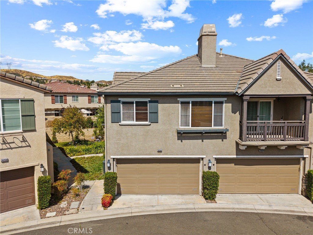 28356 Santa Rosa Lane Saugus, CA 91350 - Photo 50 of 50 a front view of a house with a garden
