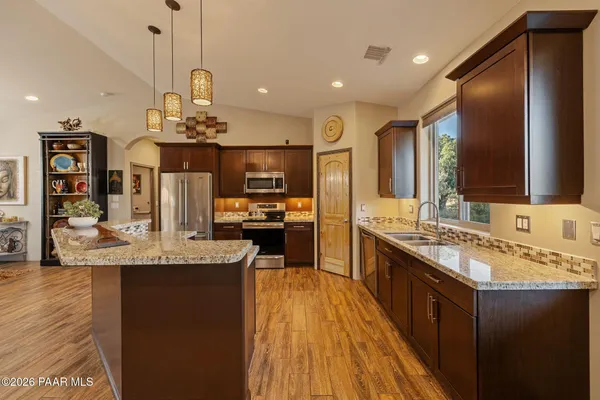 a bedroom with furniture and a couch