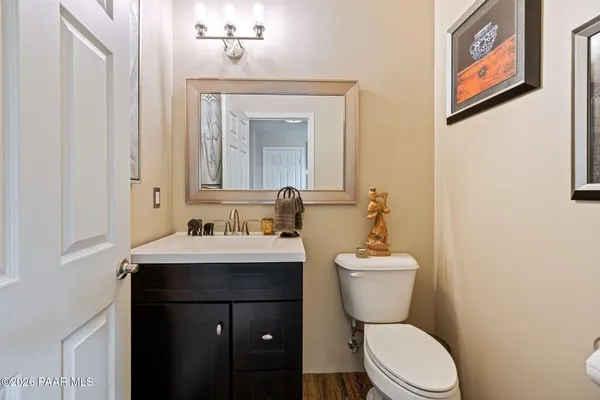 a kitchen with a table and chairs
