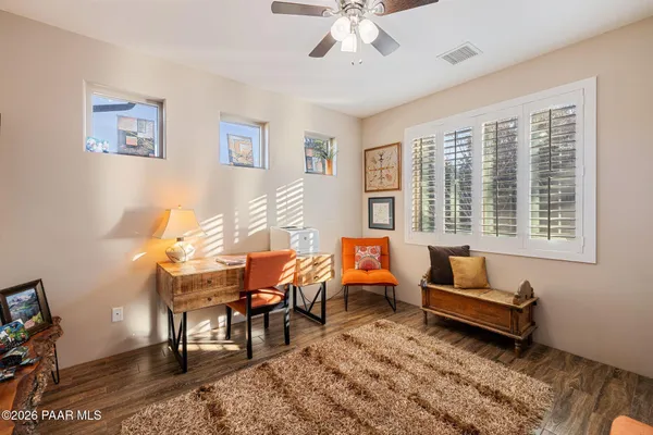 a bedroom with a large bed and closet