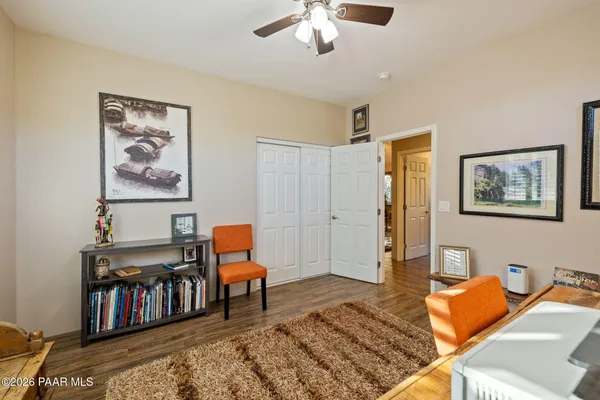 a view of living room with furniture and window