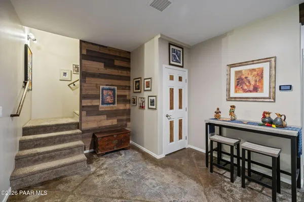 a bathroom with a sink vanity and a mirror