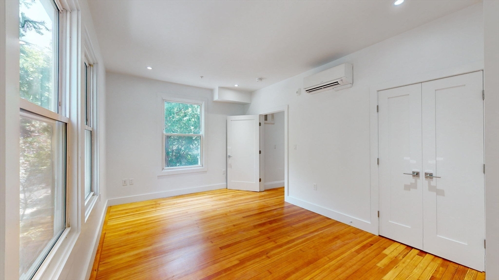 21 Regent Circle, Unit 3 Brookline, MA 02445 - Photo 12 of 21 a view of an empty room with a window
