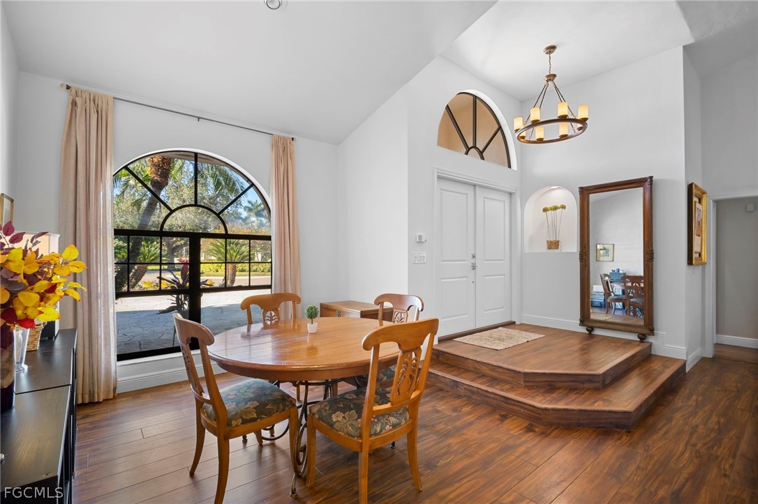 11772 Mahogany Run Fort Myers, FL 33913 - Photo 7 of 50 a view of a dining room with furniture window and wooden floor