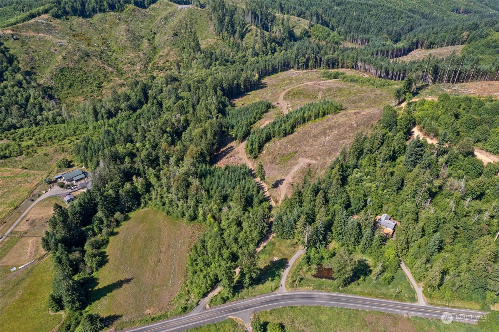 3 Bunker Creek Road Chehalis, WA 98532 - Photo 10 of 15 an aerial view of a house with a yard and lake view