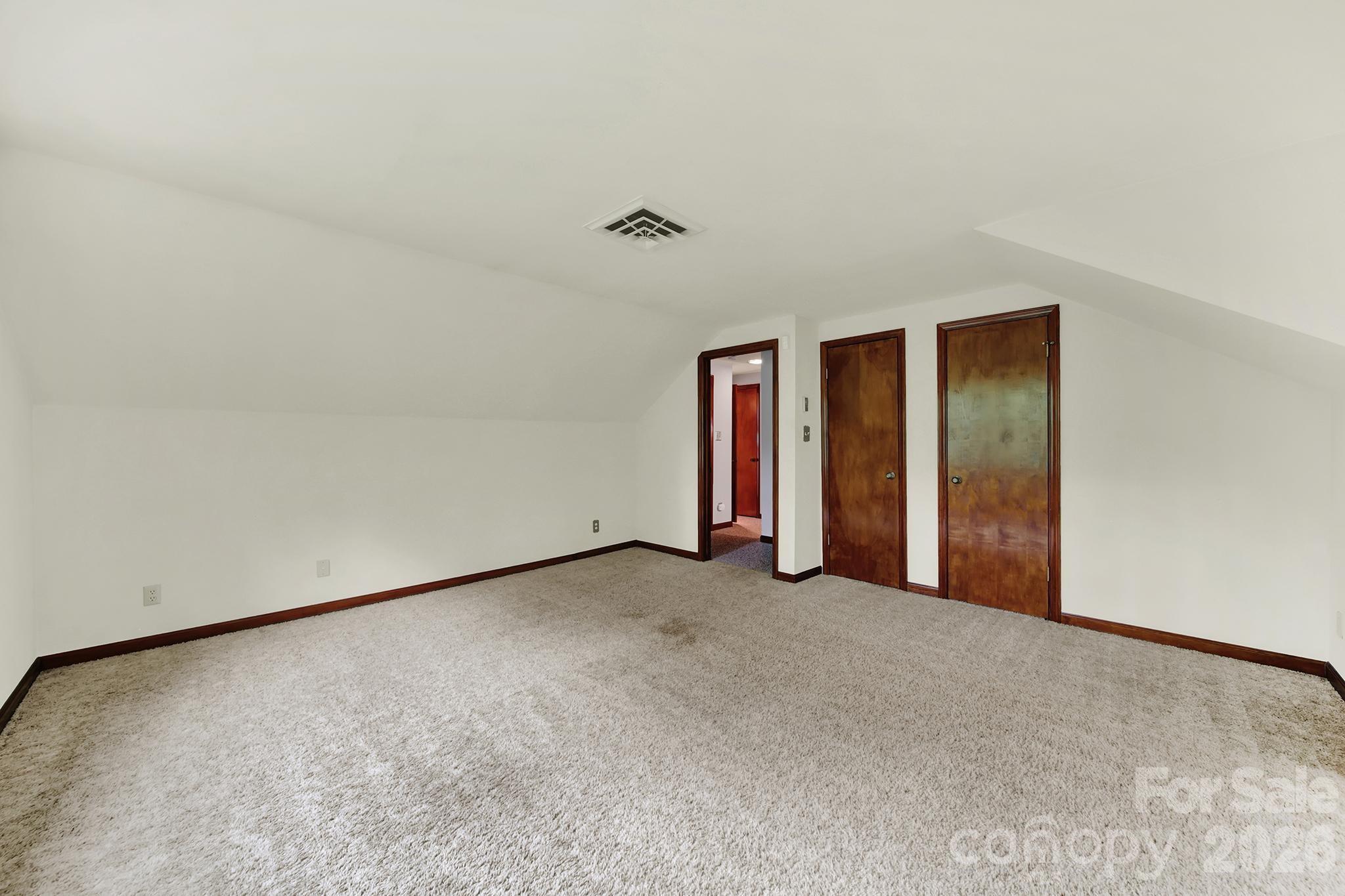5913 Tom Query Road Charlotte, NC 28213 - Photo 32 of 47 an empty room with closet