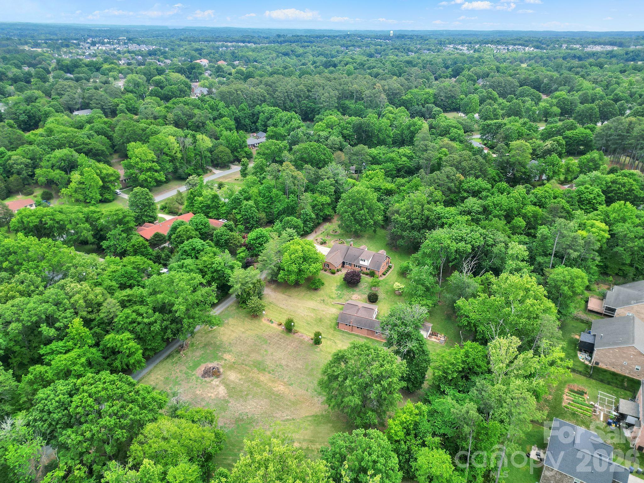 5913 Tom Query Road Charlotte, NC 28213 - Photo 44 of 47 an aerial view of a house with a yard