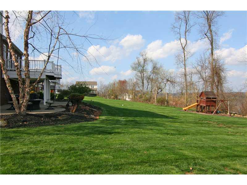 313 Buffalo Ridge Road Canonsburg, PA 15317 - Photo 11 of 25 Yard/Garden. The deck and patio provide perfect vantage points for supervising pets and play!