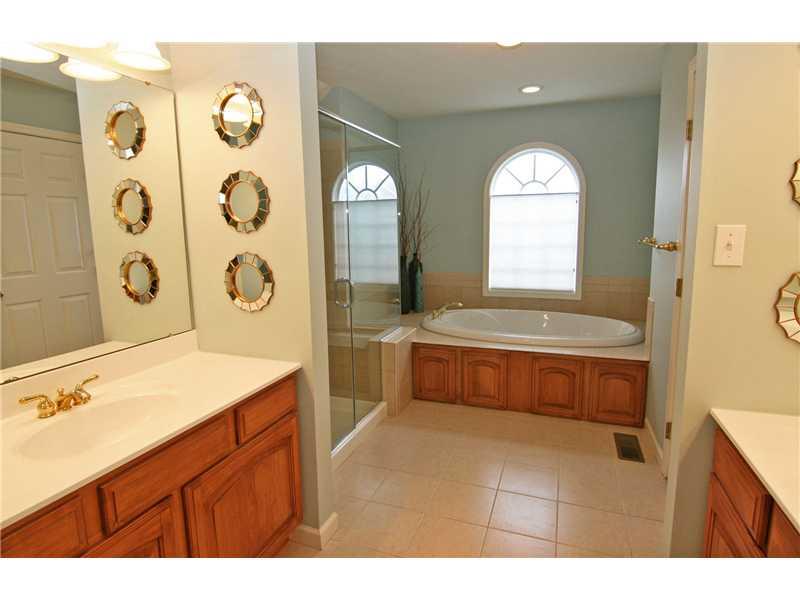 313 Buffalo Ridge Road Canonsburg, PA 15317 - Photo 19 of 25 Master Bath/Spa. A luxury bath! Jet tub, his and hers vanities, shower with glass enclosure...