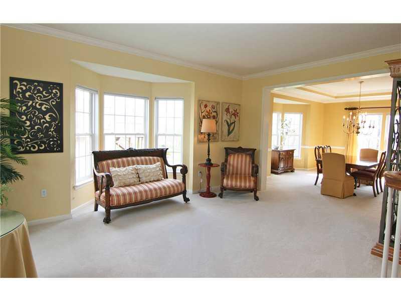313 Buffalo Ridge Road Canonsburg, PA 15317 - Photo 4 of 25 Living Room. The spacious living room has a bump-out bay window area and crown molding. the open flow between the living room and dining room is great for entertaining...