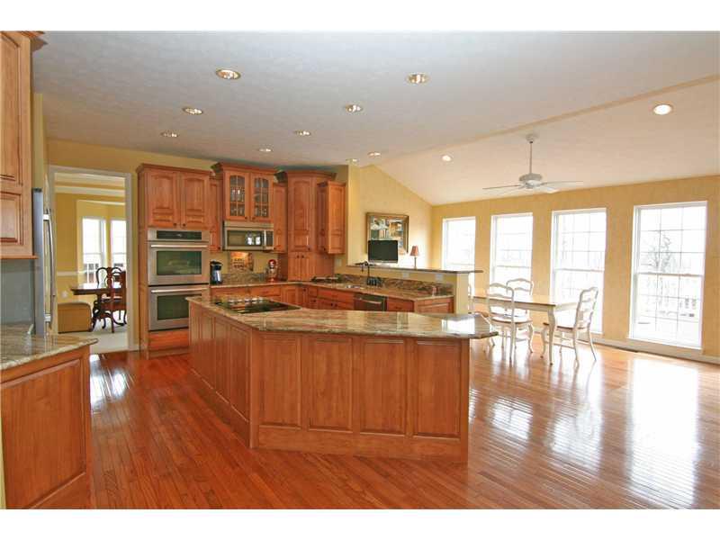 313 Buffalo Ridge Road Canonsburg, PA 15317 - Photo 7 of 25 Kitchen. WOW! A cook s delight! The kitchen is truly the heart of this home! Attractive maple cabinetry, beautiful high-end granite, gleaming hardwood flooring and a morning room with a wall of windows!