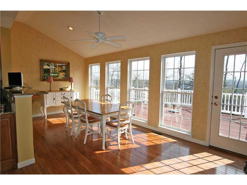 313 Buffalo Ridge Road Canonsburg, PA 15317 - Photo 10 of 25 Kitchen. A perfect way to start the day...cheerful sunny morning room with great rear yard views! An access door to the deck makes outdoor dining and entertaining easy...