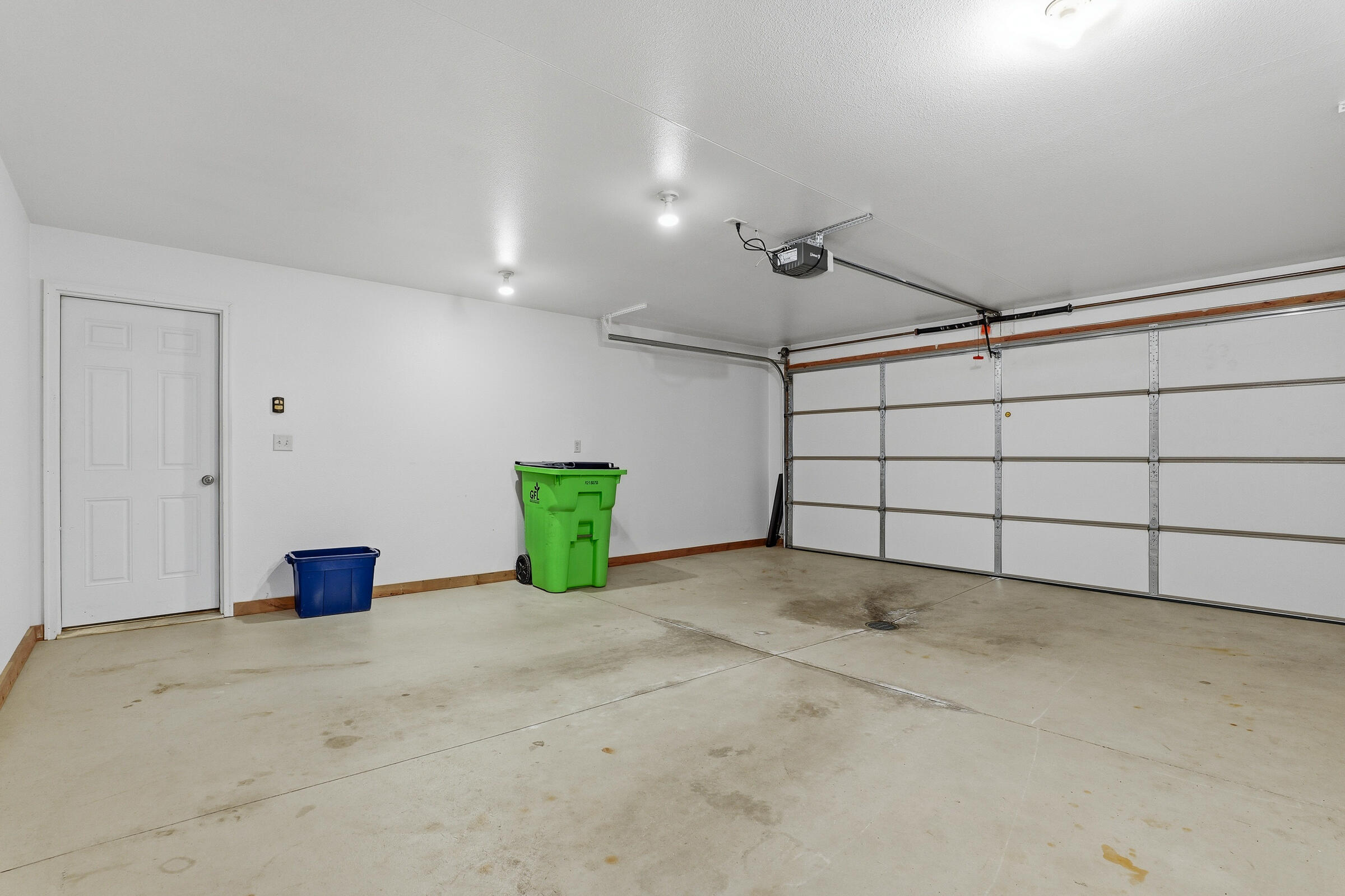 437 Kennedy Court Howards Grove, WI 53083 - Photo 25 of 28 Zero Entry Garage and Main Entrance