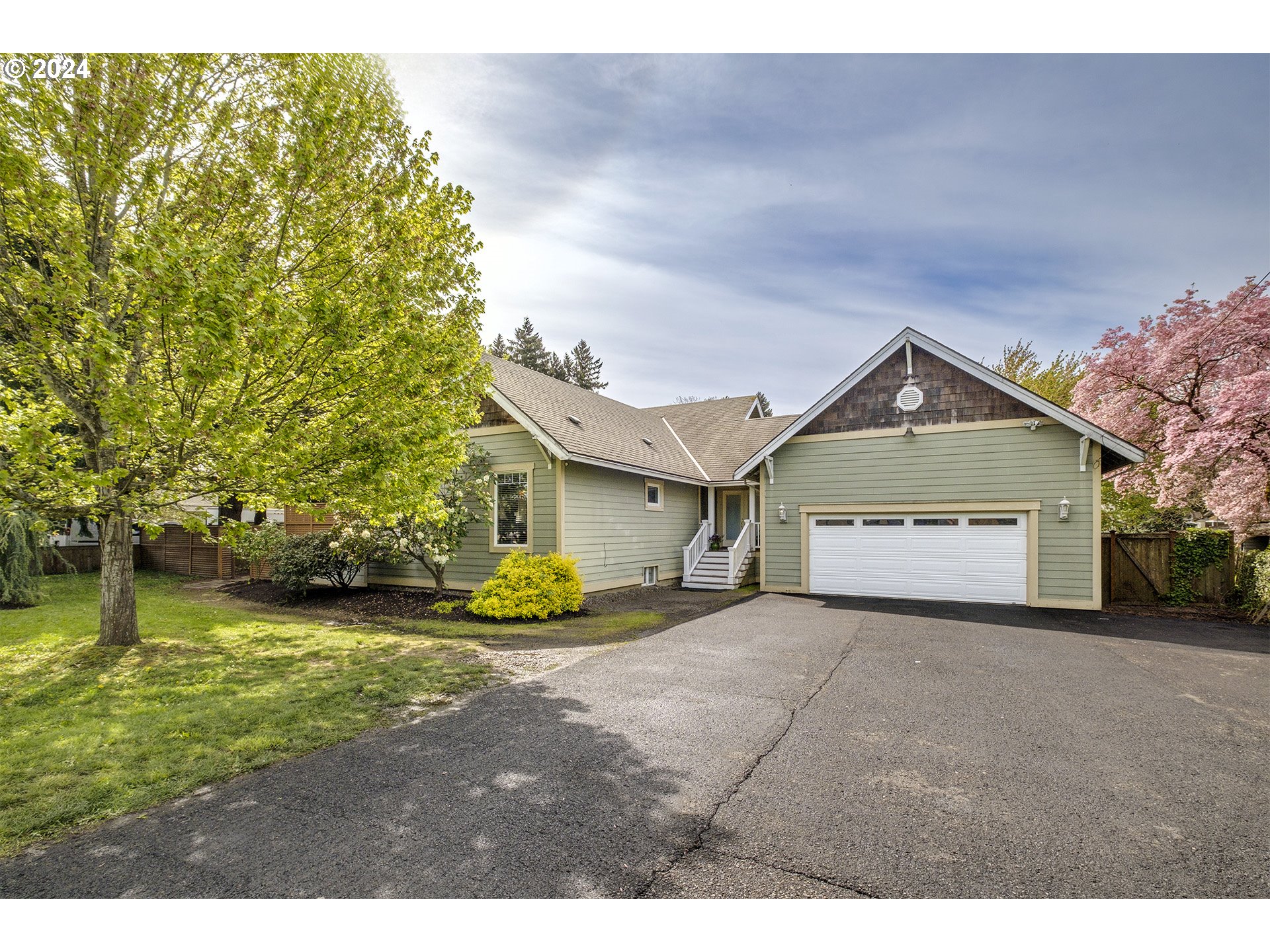 5434 Southeast King Road Milwaukie, OR 97222 - Photo 1 of 33 a view of a house with a yard and garage