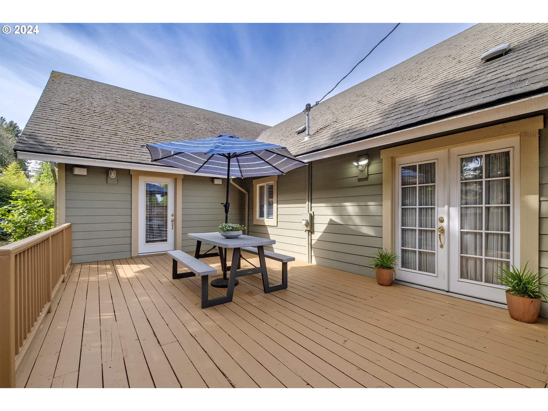 5434 Southeast King Road Milwaukie, OR 97222 - Photo 30 of 33 a view of a patio with table and chairs wooden floor