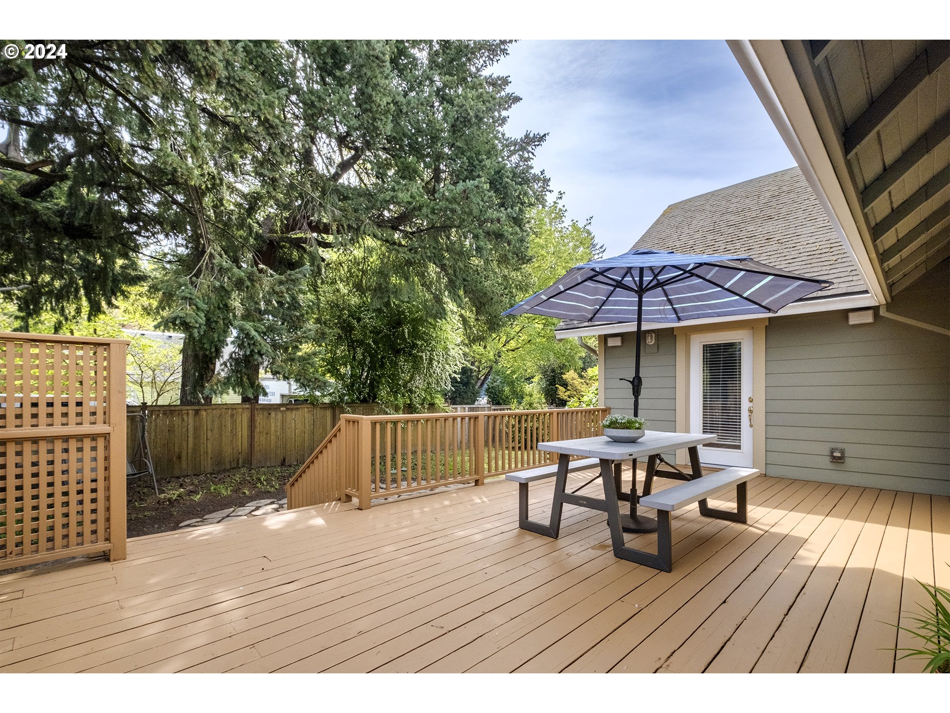 5434 Southeast King Road Milwaukie, OR 97222 - Photo 31 of 33 a terrace with outdoor seating and wooden floor