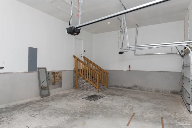 a view of a hallway with staircase