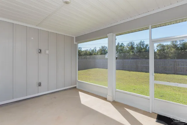 a bathroom with a large tub and shower