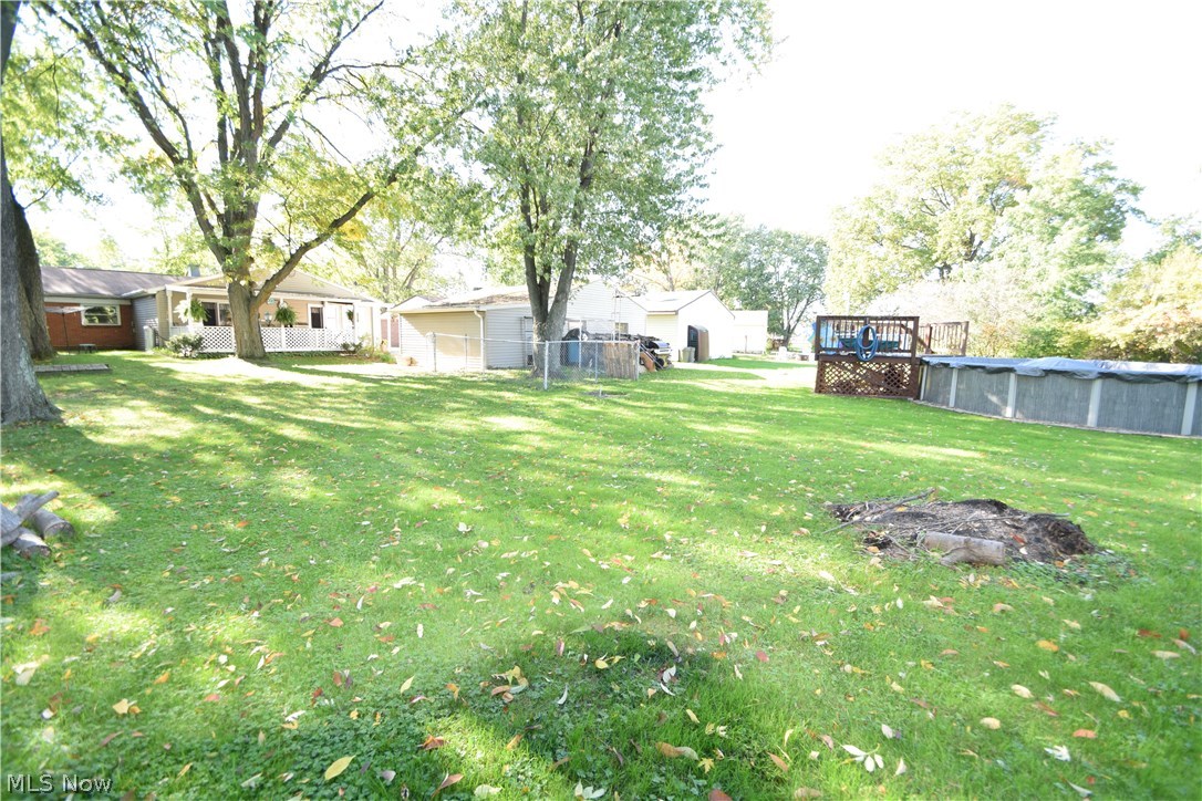 4466 Burkey Road Youngstown, OH 44515 - Photo 26 of 28 24ft round pool with deck, sits behind garage for privacy.