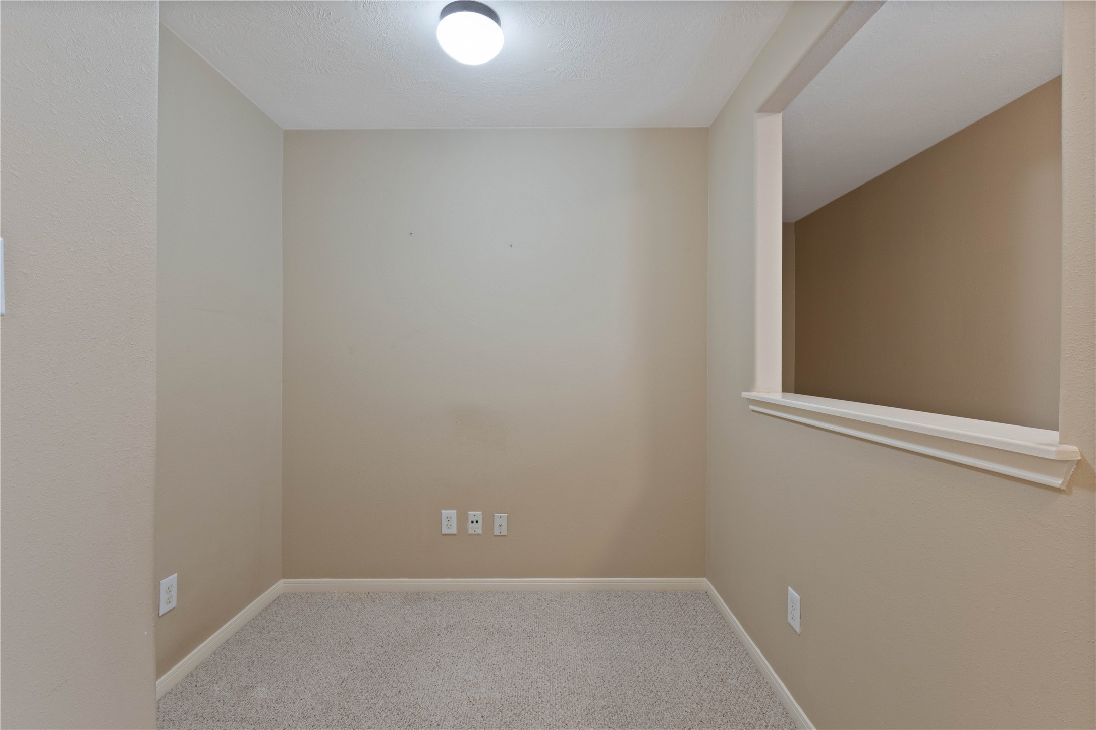 7414 Hollister Spring Houston, TX 77040 - Photo 13 of 26 Cozy office or study nook, ideal for focused work or reading.