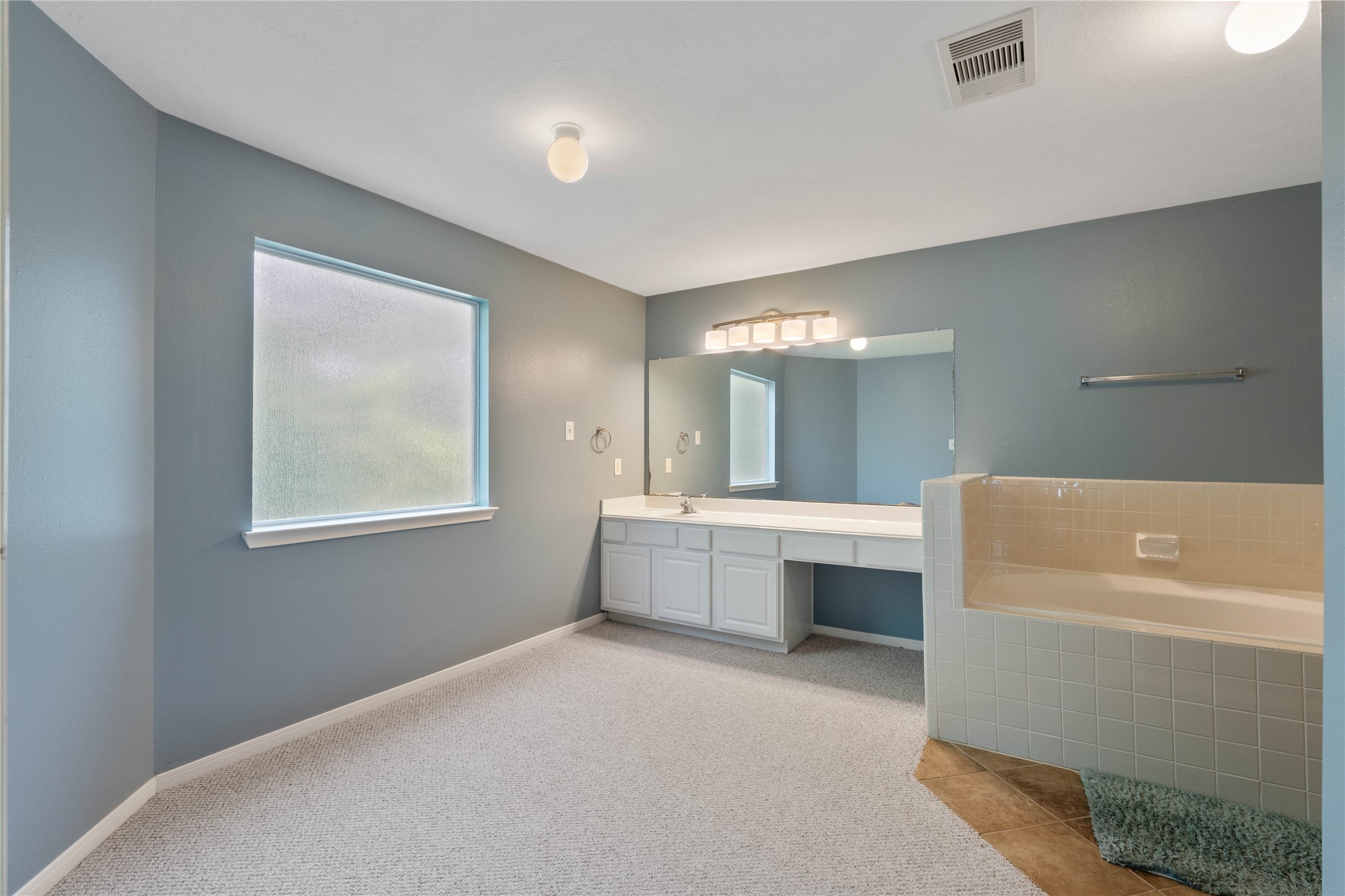 7414 Hollister Spring Houston, TX 77040 - Photo 18 of 26 Indulge in the luxurious primary bath with a relaxing soaking tub and separate shower.