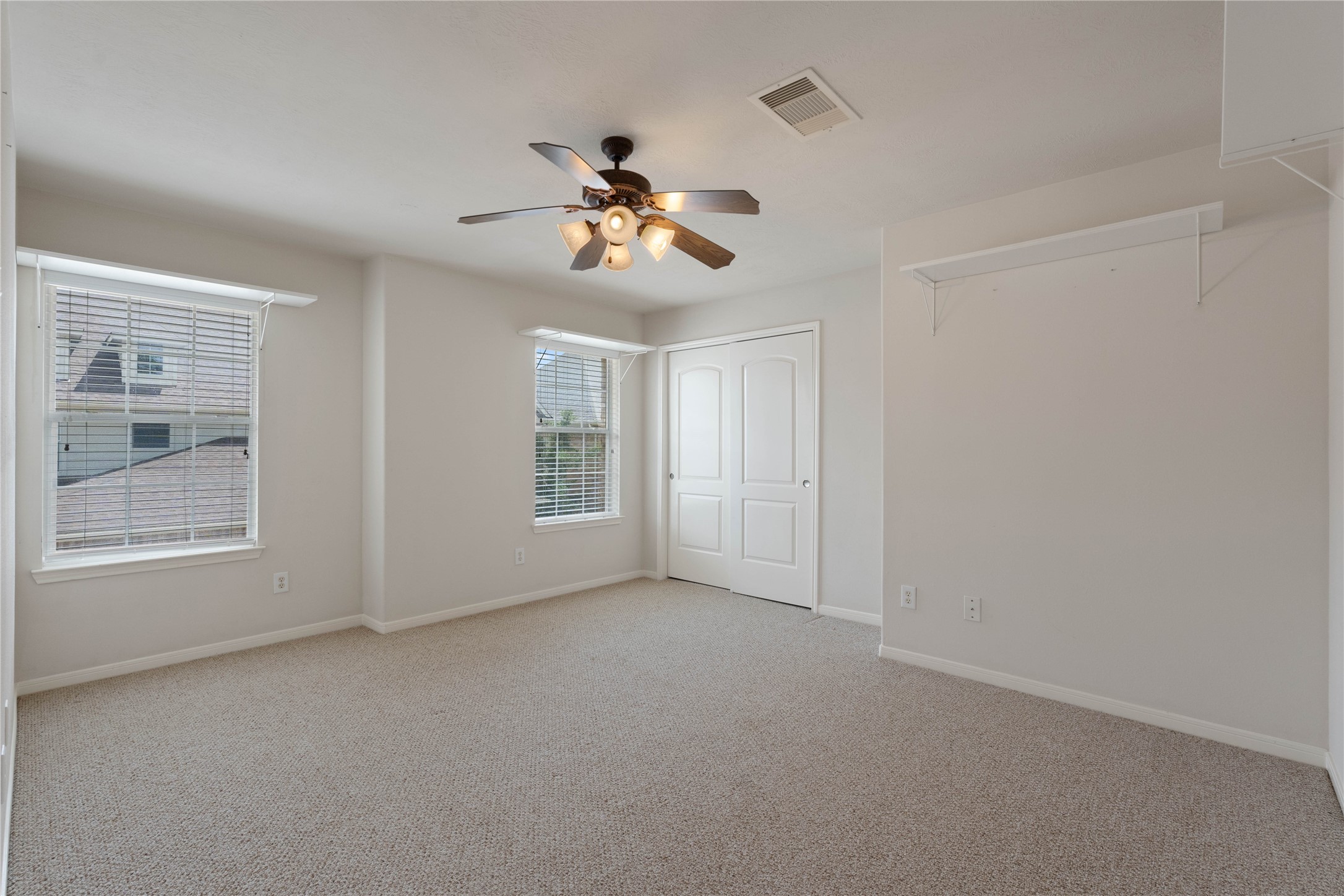 7414 Hollister Spring Houston, TX 77040 - Photo 22 of 26 Bright and roomy bedroom with ample natural light.
