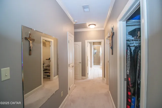 a white bath tub sitting next to a white sink