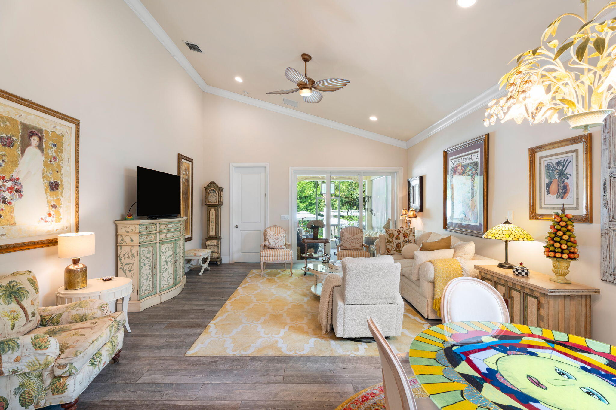 412 Southwest Akron Avenue Stuart, FL 34994 - Photo 18 of 60 a living room with furniture fireplace and a flat screen tv