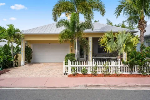 a view of a house with a street