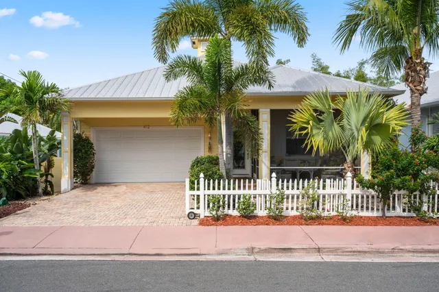 a view of a house with a street