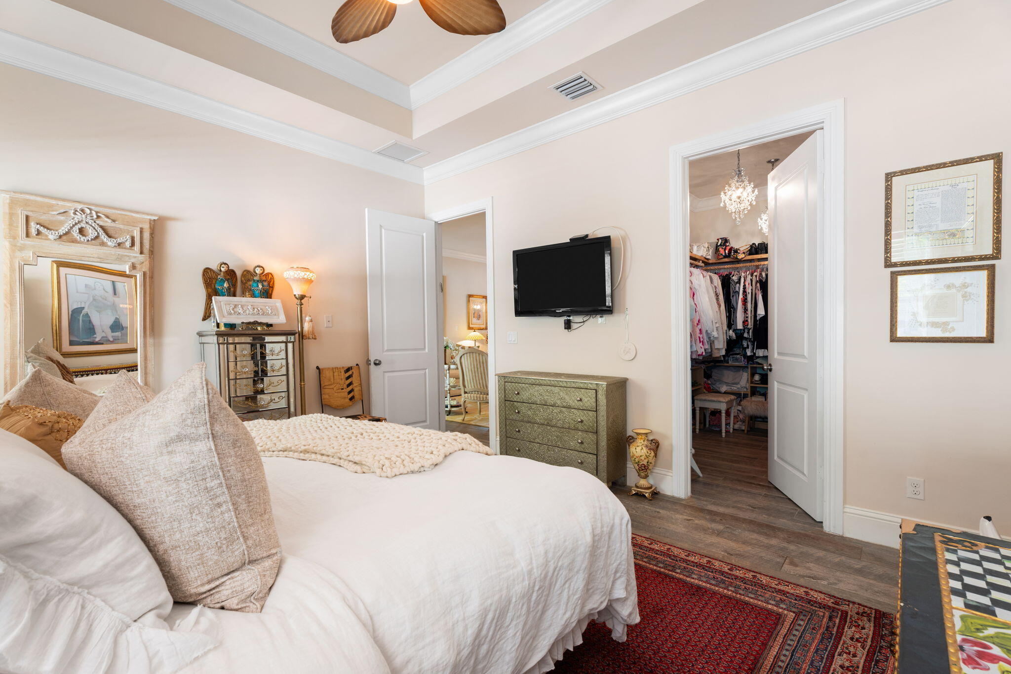 412 Southwest Akron Avenue Stuart, FL 34994 - Photo 22 of 60 a bedroom with a bed and a flat screen tv