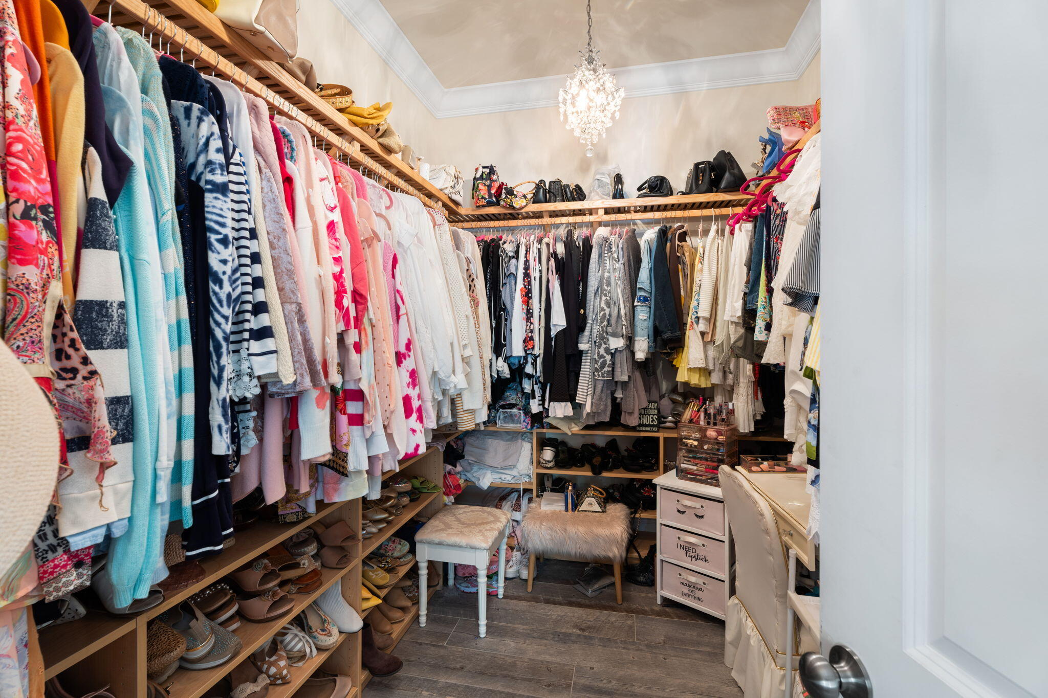 412 Southwest Akron Avenue Stuart, FL 34994 - Photo 23 of 60 a view of walk in closet with clothes