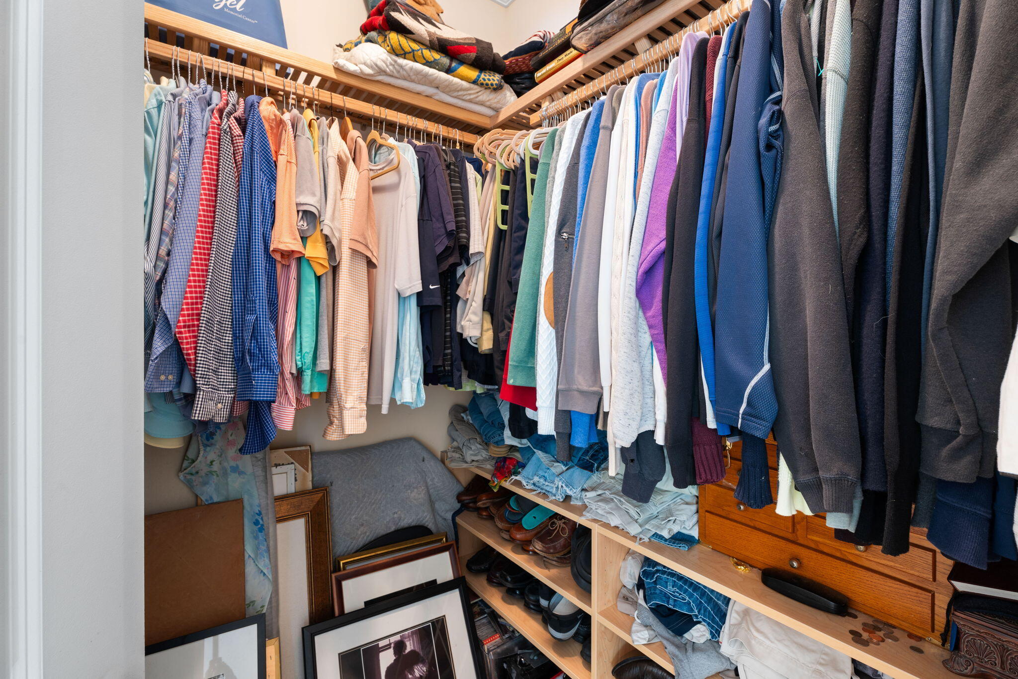 412 Southwest Akron Avenue Stuart, FL 34994 - Photo 23 of 60 a view of walk in closet with clothes and shoes