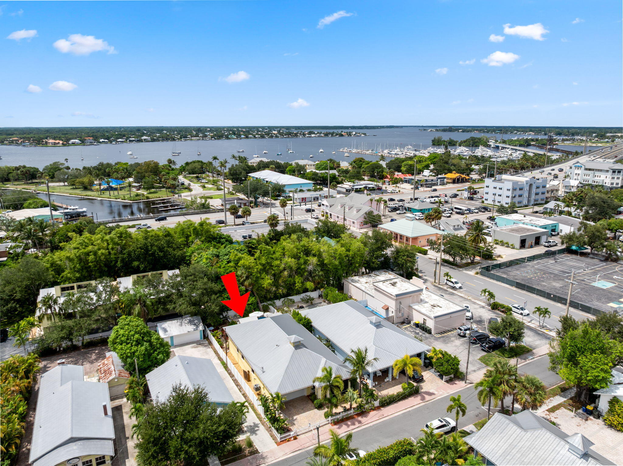 412 Southwest Akron Avenue Stuart, FL 34994 - Photo 3 of 60 an aerial view of residential houses with outdoor space