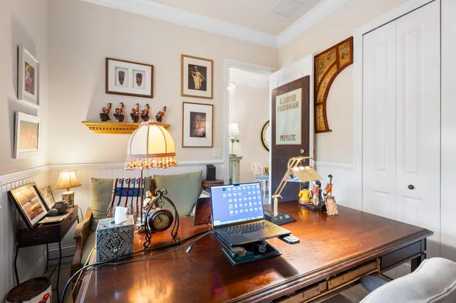 an aerial view of a house with outdoor space