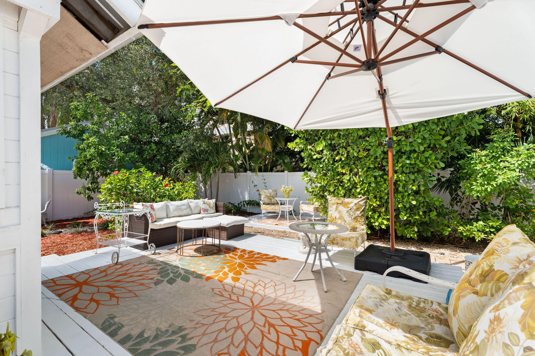 412 Southwest Akron Avenue Stuart, FL 34994 - Photo 46 of 60 a view of backyard of house with seating space