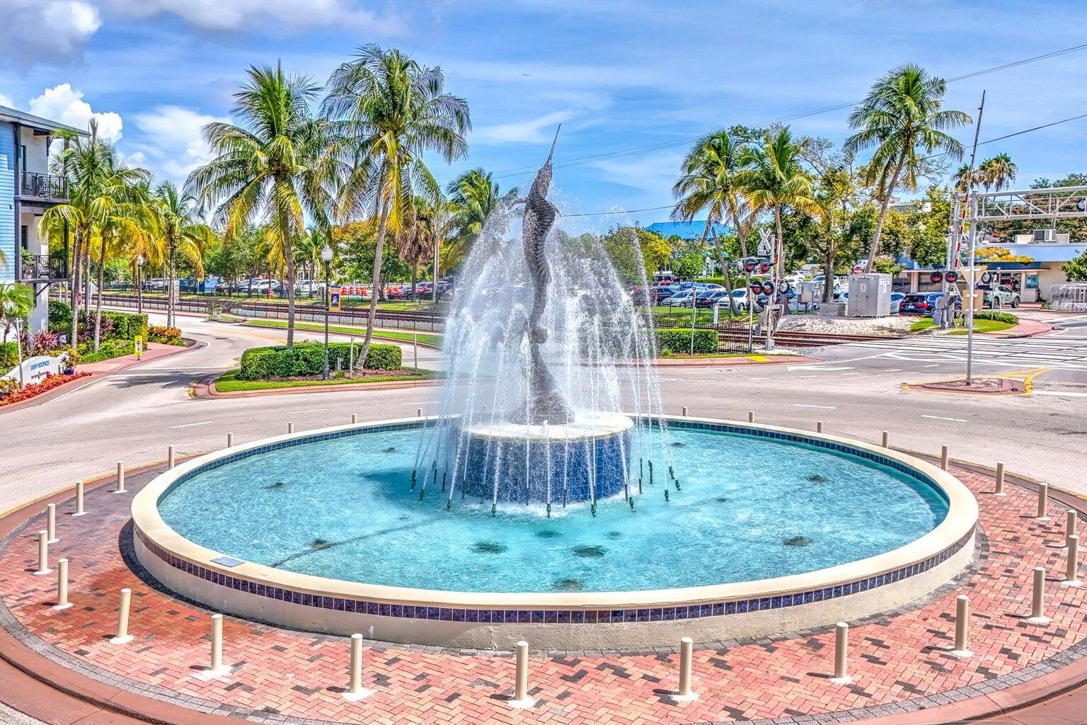 412 Southwest Akron Avenue Stuart, FL 34994 - Photo 59 of 60 a view of a swimming pool with a sitting space