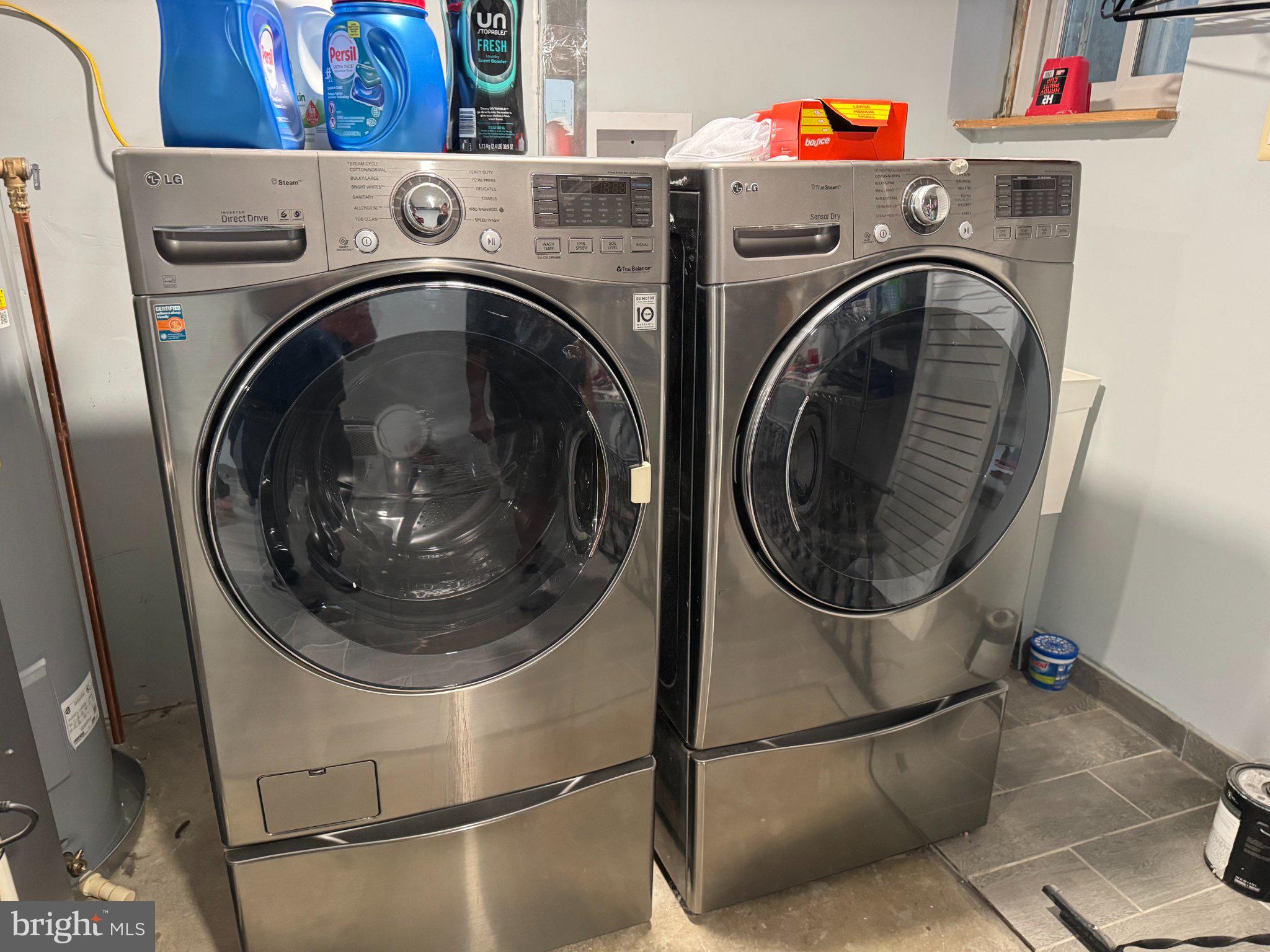 6603 Huntsman Boulevard Springfield, VA 22152 - Photo 40 of 64 Modern laundry appliances in sleek design.