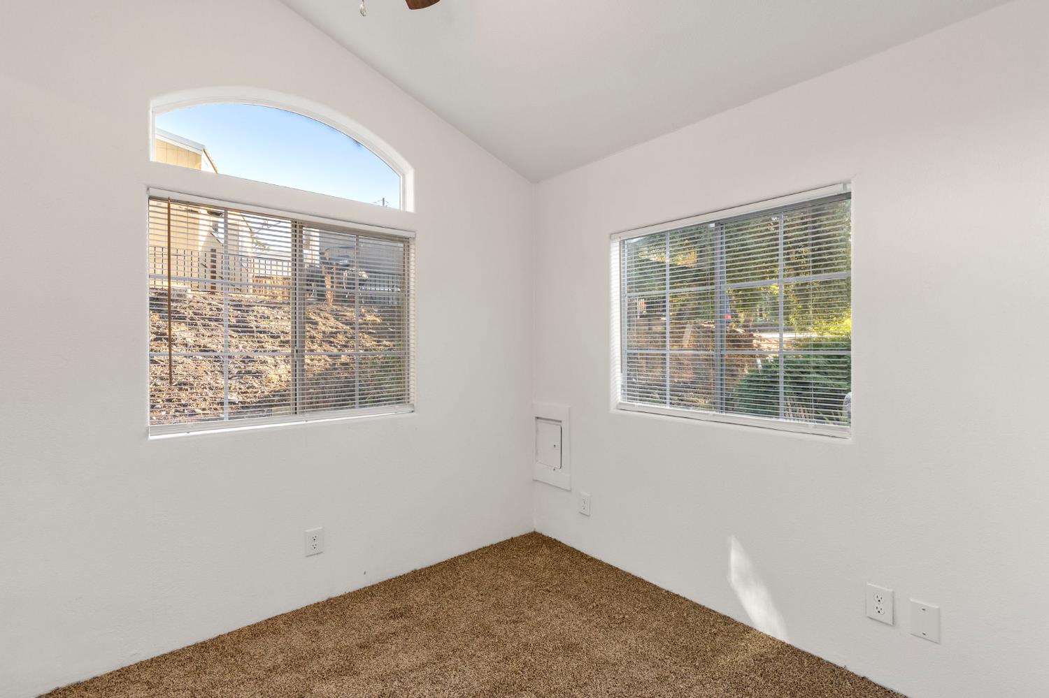 607 Mountain Ranch Road, Unit 5 San Andreas, CA 95249 - Photo 14 of 16 an empty room with a window