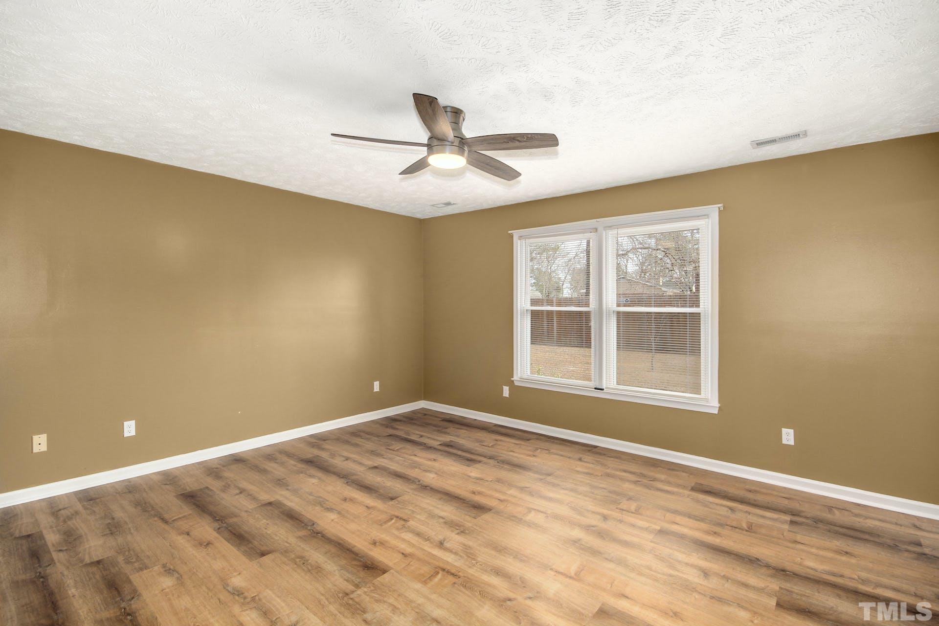 813 Rim Road Fayetteville, NC 28314 - Photo 11 of 25 a view of an empty room with a window