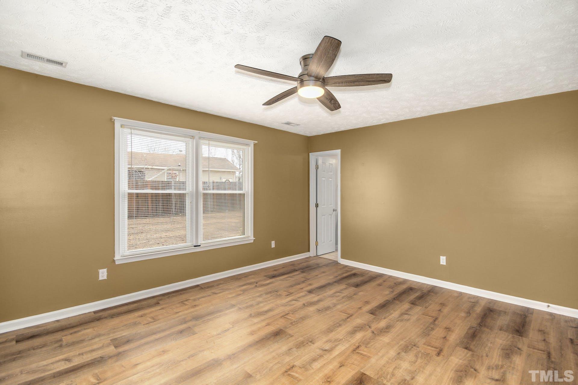 813 Rim Road Fayetteville, NC 28314 - Photo 12 of 25 a view of an empty room with a window