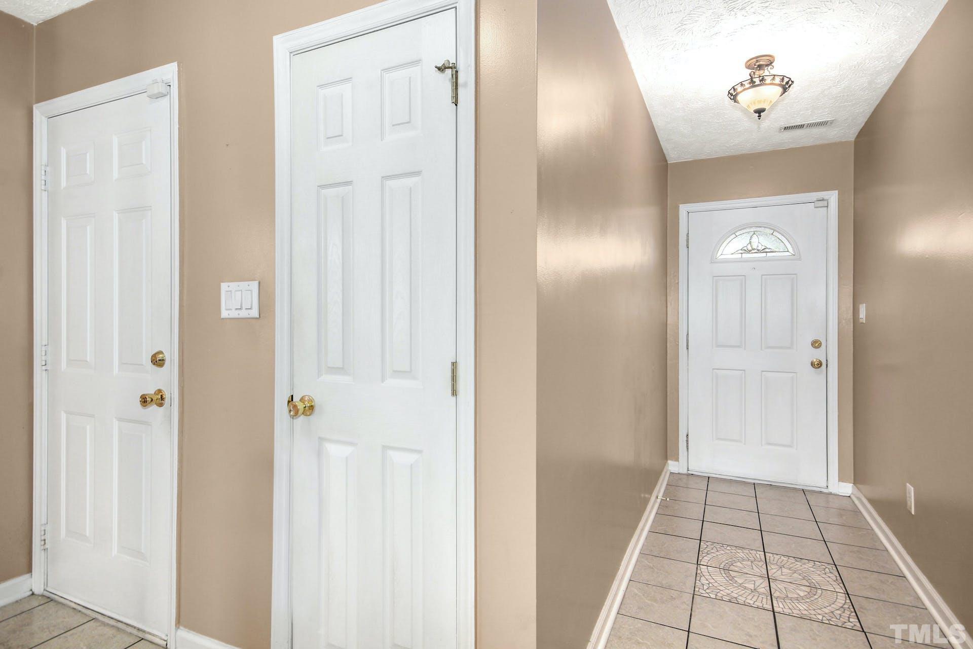 813 Rim Road Fayetteville, NC 28314 - Photo 19 of 25 a view of a hallway to a bedroom