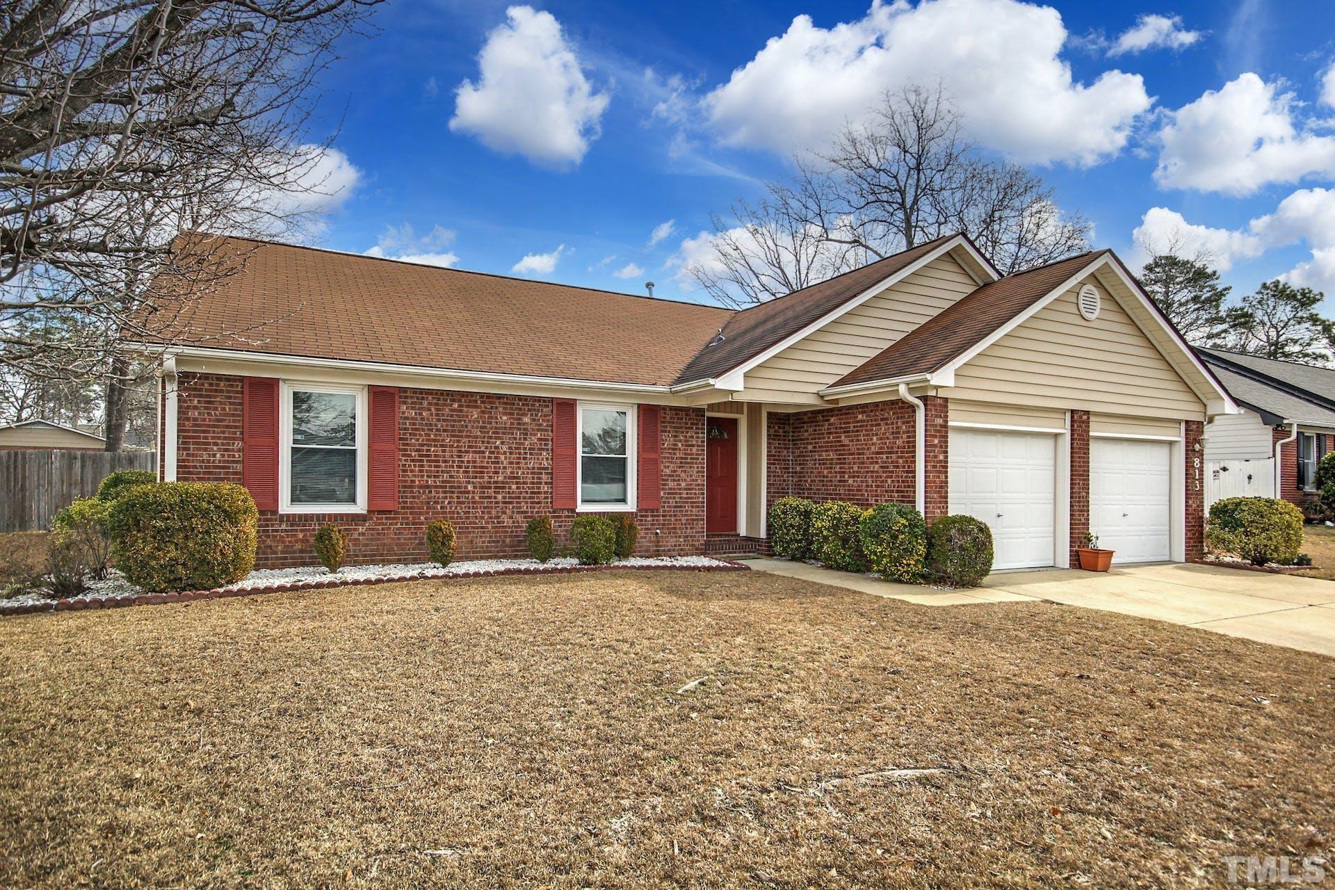 813 Rim Road Fayetteville, NC 28314 - Photo 2 of 25 front view of a house with a patio